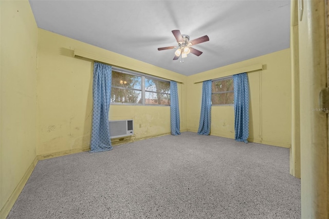 spare room with a ceiling fan