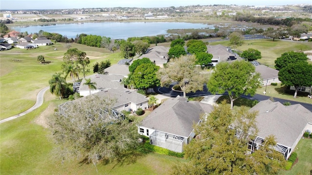 bird's eye view featuring a water view and a residential view