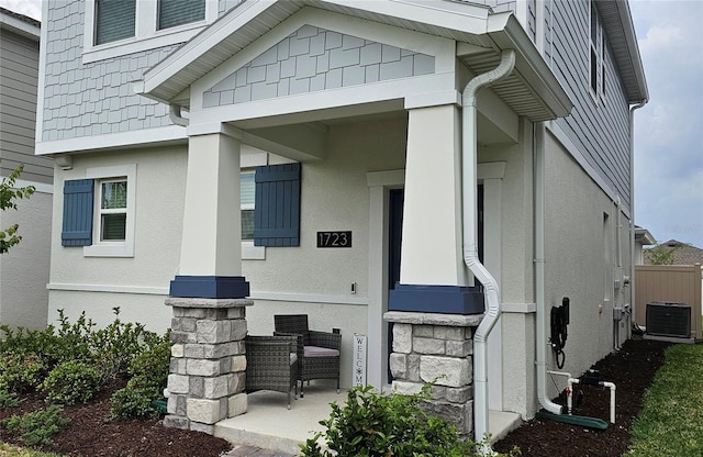 1723 Happiness Row, Kissimmee, FL 34744 - entrance to property with central air condition unit and stucco siding