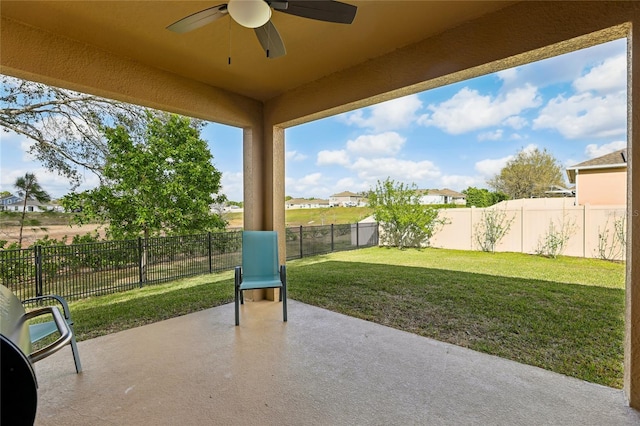 view of patio / terrace featuring a fenced backyard and ceiling fan