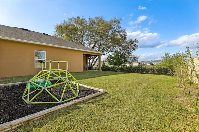 view of yard featuring fence