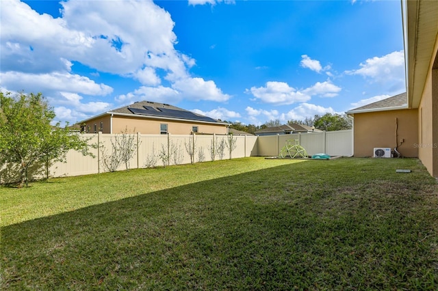 view of yard with a fenced backyard