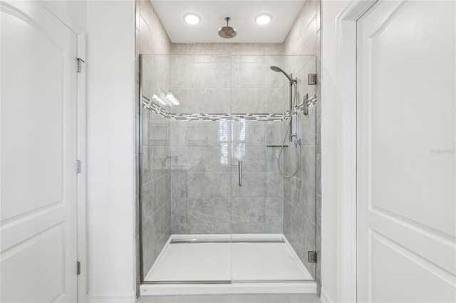 full bathroom with a stall shower