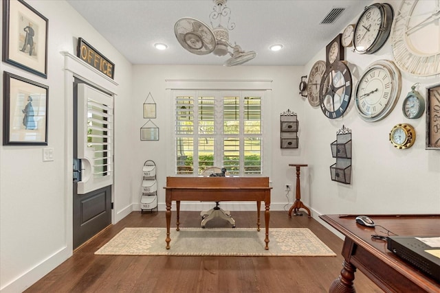 office with recessed lighting, dark wood-type flooring, baseboards, and visible vents