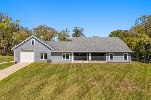 single story home with fence, a garage, a front lawn, driveway, and a shingled roof