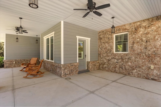 view of patio featuring a ceiling fan