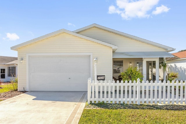 ranch-style house with a garage, a fenced front yard, and concrete driveway