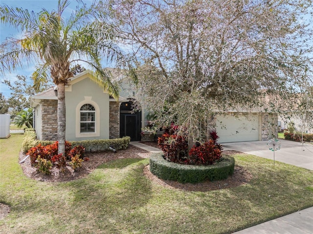 view of front of home with stone siding, stucco siding, concrete driveway, and a front yard