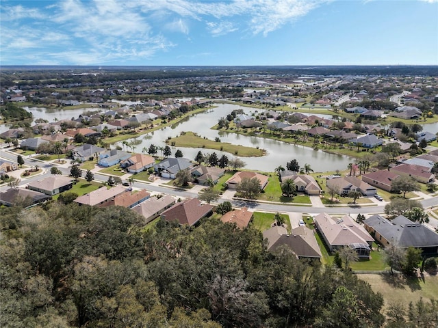 aerial view with a residential view and a water view