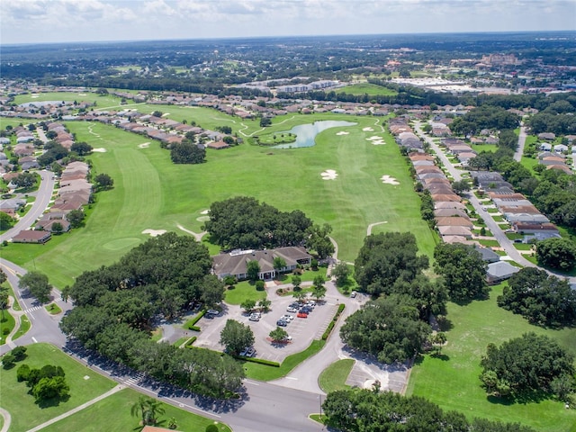 birds eye view of property featuring a residential view, a water view, and golf course view