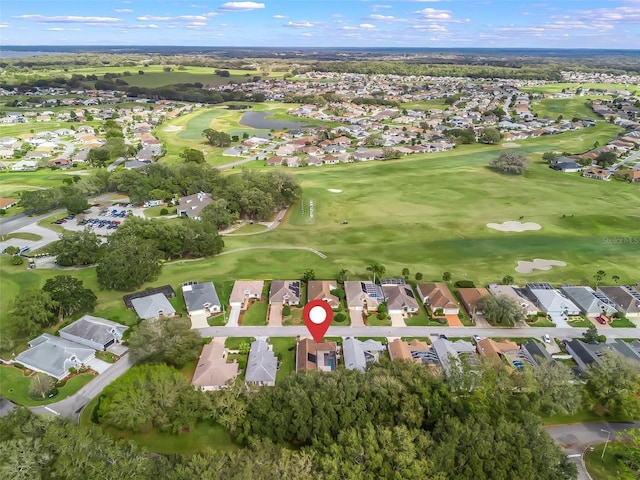 aerial view featuring a residential view and view of golf course