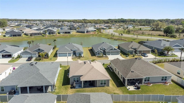 aerial view featuring a residential view and a water view