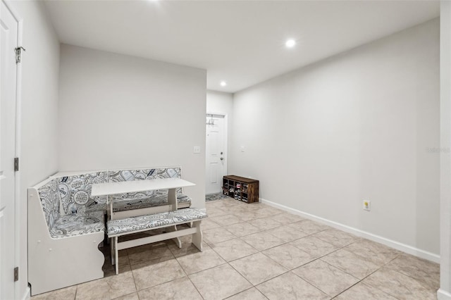 255 Blueberry Ln, Davenport, FL 33837 - sitting room with light tile patterned floors and recessed lighting