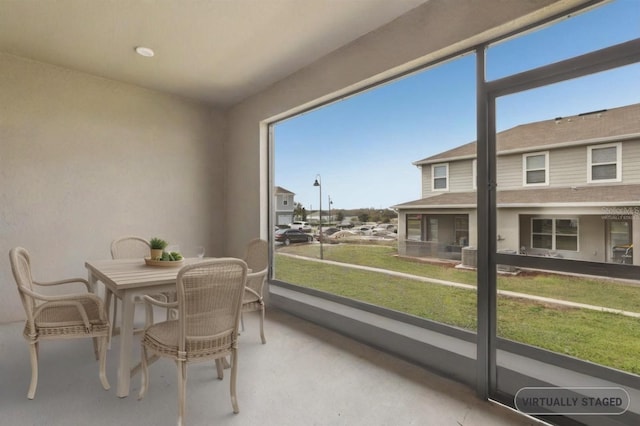 255 Blueberry Ln, Davenport, FL 33837 - sunroom featuring outdoor dining area