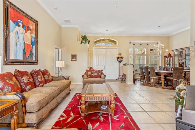 living room with light tile patterned floors, baseboards, a chandelier, and crown molding