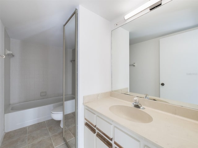 bathroom with toilet, tile patterned floors, tub / shower combination, and vanity