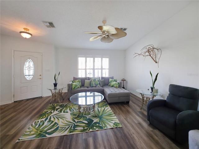 6106 Kittiwake Dr, Lakeland, FL 33809 - living room featuring baseboards, wood finished floors, visible vents, and ceiling fan