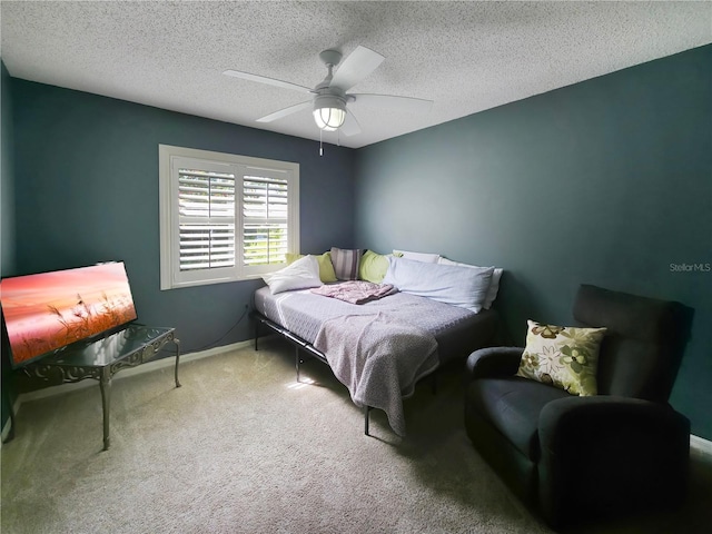 6106 Kittiwake Dr, Lakeland, FL 33809 - bedroom with ceiling fan, carpet flooring, baseboards, and a textured ceiling