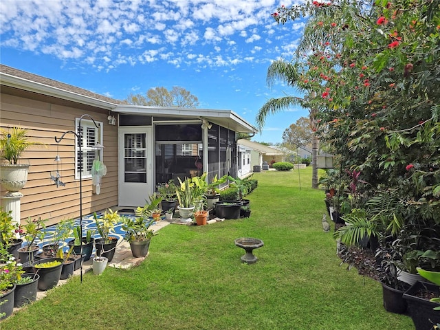 6106 Kittiwake Dr, Lakeland, FL 33809 - view of yard featuring a sunroom