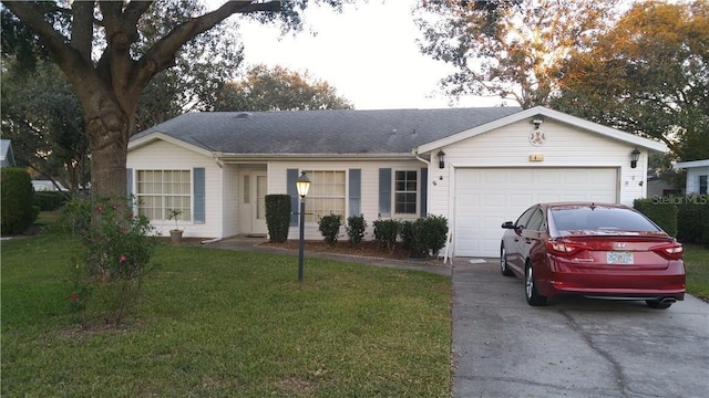 single story home featuring an attached garage, driveway, a front lawn, and roof with shingles