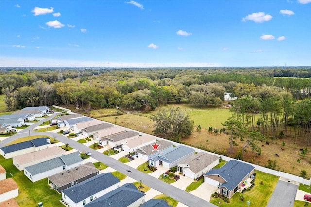 aerial view with a residential view and a forest view