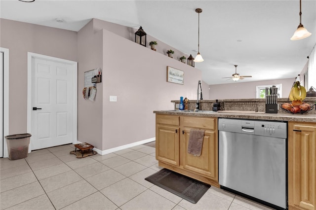 kitchen with light tile patterned floors, dishwasher, ceiling fan, pendant lighting, and a sink