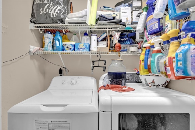 laundry area with washing machine and dryer and laundry area