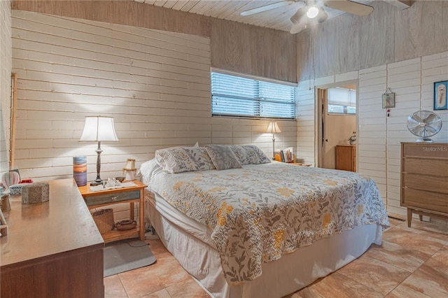 bedroom featuring light tile patterned floors and ceiling fan