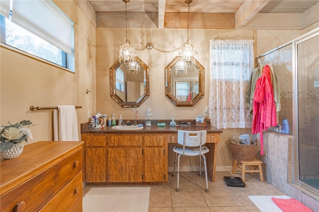 bathroom featuring beam ceiling, a shower stall, vanity, and tile patterned floors