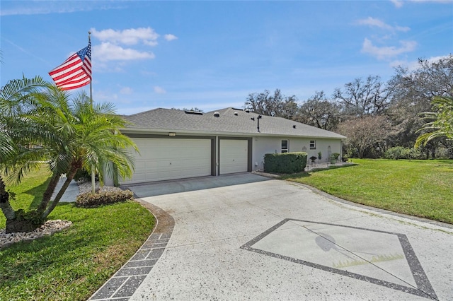 view of front facade featuring concrete driveway, an attached garage, a front lawn, and stucco siding