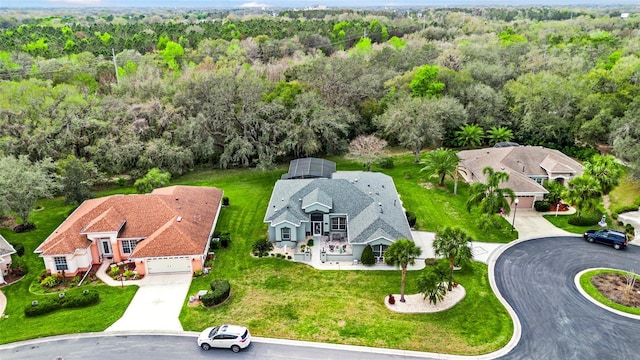 aerial view featuring a forest view