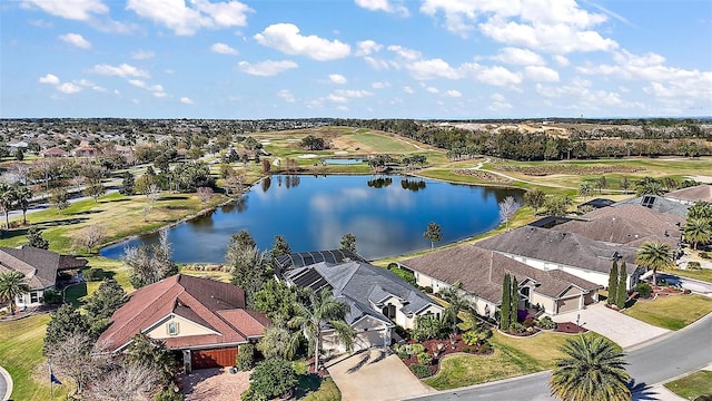 bird's eye view featuring a water view and a residential view