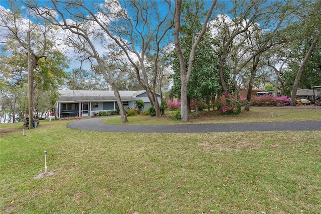 view of front of house with a front lawn