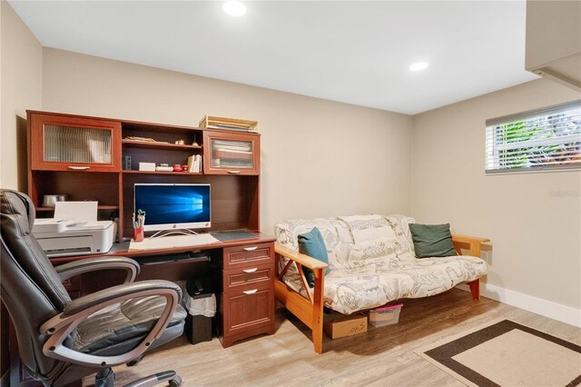 home office with light wood-type flooring, baseboards, and recessed lighting