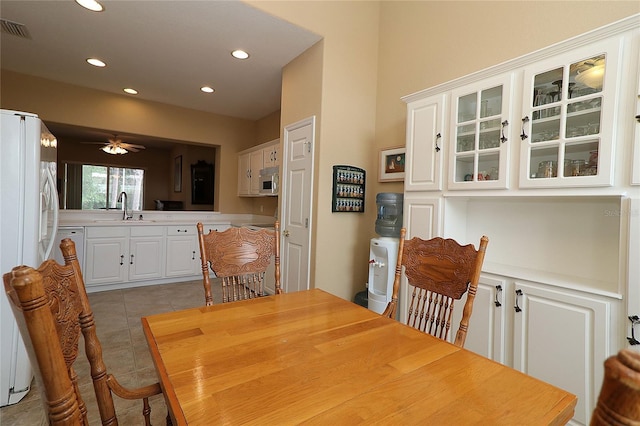 dining space featuring light tile patterned floors, ceiling fan, visible vents, and recessed lighting