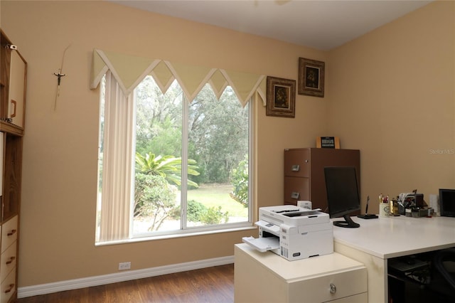 office featuring wood finished floors and baseboards