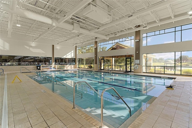 community pool with a patio area