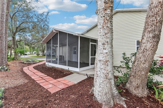 exterior space with a sunroom