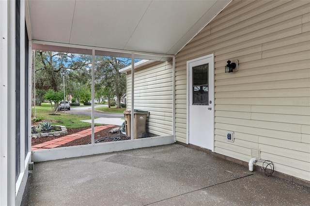 exterior space featuring lofted ceiling