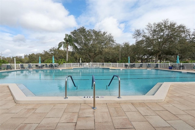 community pool with fence