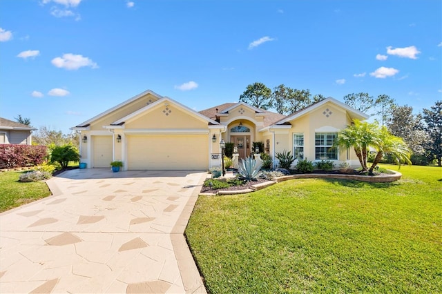 view of front of house with concrete driveway, a front yard, an attached garage, and stucco siding