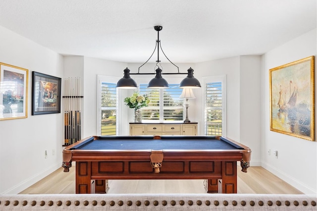 game room with baseboards, pool table, and light wood-style floors