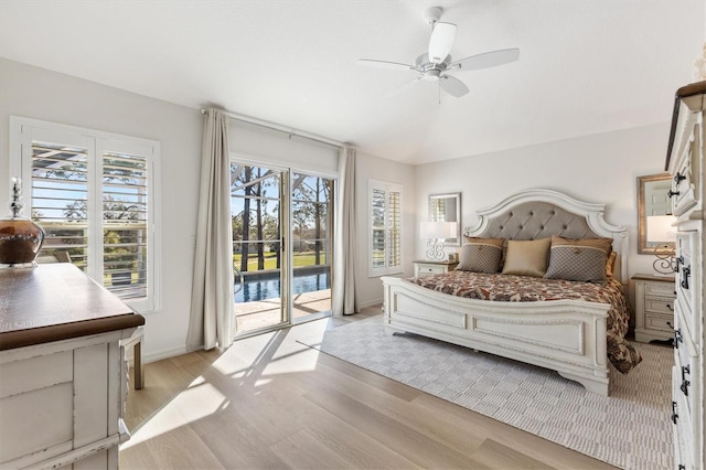 bedroom featuring access to outside, baseboards, ceiling fan, and light wood finished floors