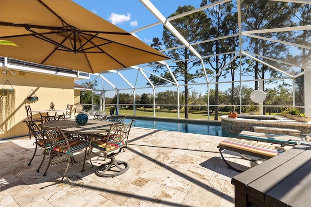 outdoor pool with outdoor dining space, a patio area, and a lanai