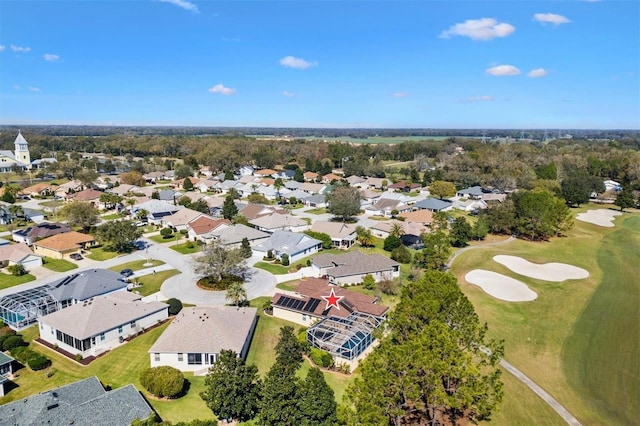 birds eye view of property with a residential view