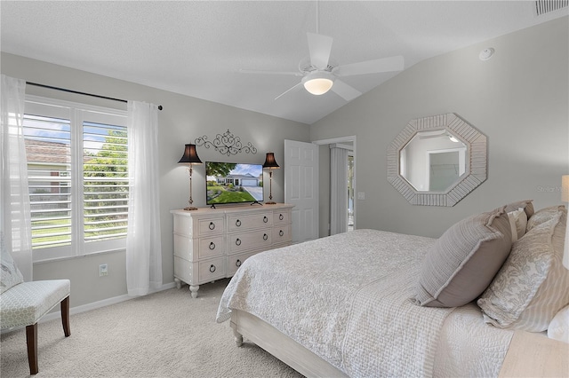 bedroom with lofted ceiling, visible vents, a ceiling fan, light carpet, and baseboards