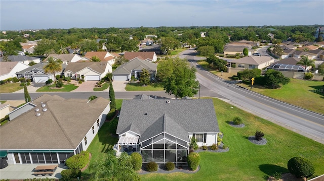 drone / aerial view with a residential view