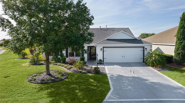 view of front of house with concrete driveway, roof with shingles, a front yard, and a garage