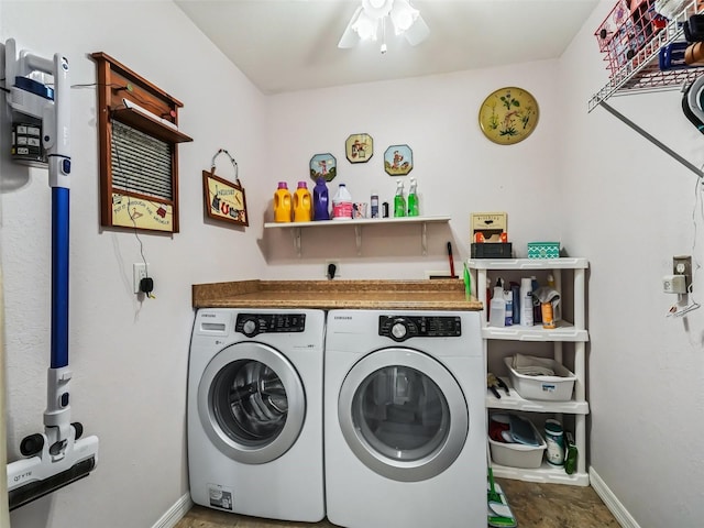 laundry room with laundry area, washing machine and dryer, a ceiling fan, and baseboards