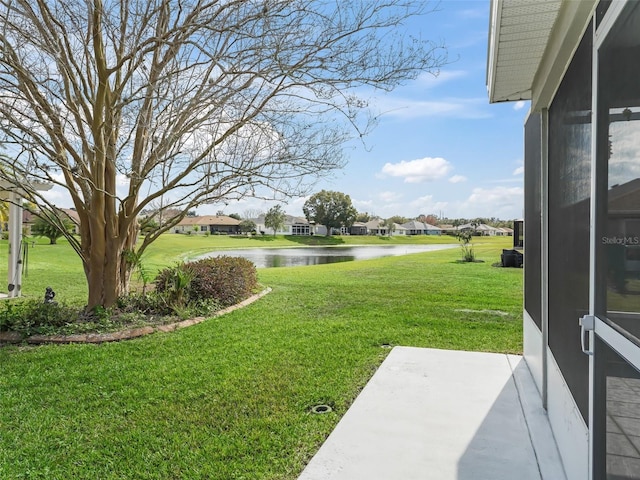 view of yard with a water view